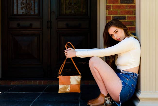 Lisbon Cowhide Clutch Bag in Tan & White